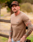 Front view of The 10-Point Tee with small chest logo and classic outdoorsman design