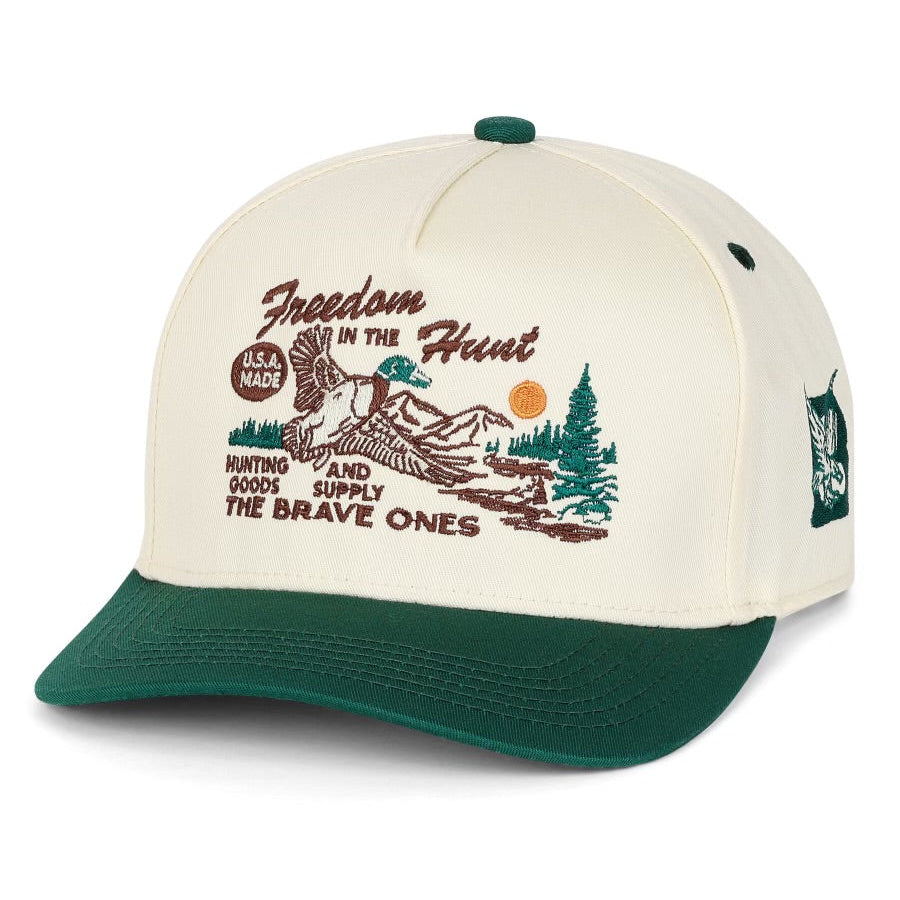 The Brave Ones hunting cap with "Freedom in the Hunt" slogan and vintage colorway