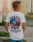 "Born & Raised T-Shirt by The Brave Ones – Patriotic vintage truck and flag graphic tee"
